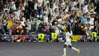 Sorak sorai para pendukung Real Madrid saat menyaksikan pertandingan Real Madrid kontra Liverpool di laga final Liga Champions. AP Photo/Manu Fernandez. 