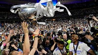 Para pemain Real Madrid merayakan kemenangan Los Merengues yang berhasil mengalahkan Liverpool serta menjadi juara Liga Champions. JAVIER SORIANO/AFP via Getty Images.