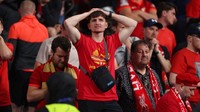 Namun, fans yang bisa masuk harus melihat kenyataan pahit, saat Liverpool kalah 0-1 dari Real Madrid. The Reds gagal menjadi juara Liga Champions. (Foto: Robbie Jay Barratt - AMA/Getty Images)