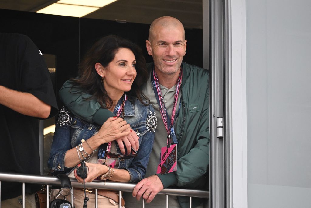 TOPSHOT - French football coach and former player Zinedine Zidane (R) and his wife Veronique watch from a balcony the  Monaco Formula 1 Grand Prix at the Monaco street circuit in Monaco, on May 29, 2022. (Photo by CHRISTIAN BRUNA / POOL / AFP) (Photo by CHRISTIAN BRUNA/POOL/AFP via Getty Images)