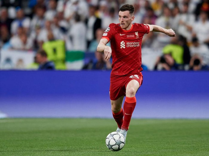 Andrew Robertson of Liverpool runs with the ball during the UEFA Champions League final match between Liverpool FC and Real Madrid at Stade de France on May 28, 2022 in Paris, France. (Photo by Jose Breton/Pics Action/NurPhoto via Getty Images)