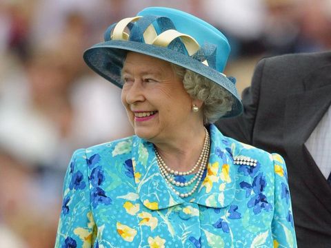 WINDSOR, ENGLAND - JULY 27:  Britain's Queen Elizabeth smiles after the England v Mexico Golden Jubilee Cup 2003 match during the Cartier International Polo Day July 27, 2003 in Windsor, England. The day was in aid of The Polo Charity Trust. (Photo by Scott Barbour/Getty Images)