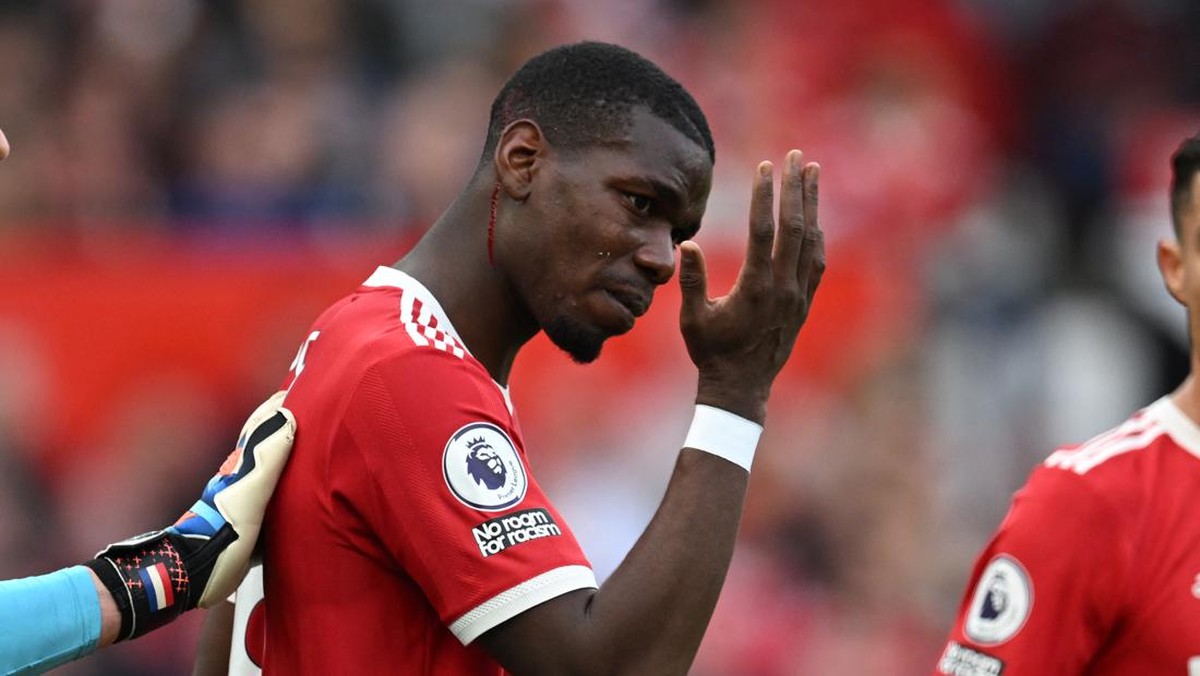 Paul Pogba akan berstatus bebas transfer usai kontraknya bersama Manchester United habis pada 30 Juni (Foto: AFP via Getty Images/PAUL ELLIS)