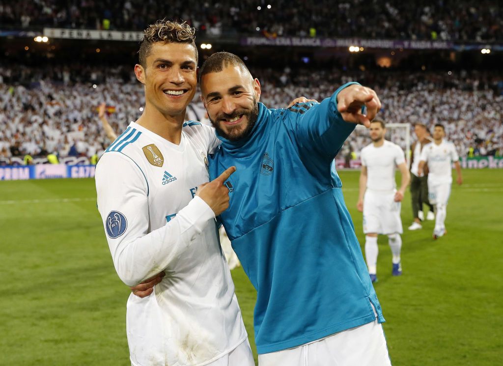 MADRID, SPAIN - MAY 01: Karim Benzema (R) and Cristiano Ronaldo of Real Madrid celebrate after the UEFA Champions League Semi Final Second Leg match between Real Madrid and Bayern Muenchen at Estadio Santiago Bernabeu on May 1, 2018 in Madrid, Spain. (Photo by Angel Martinez/Real Madrid via Getty Images)