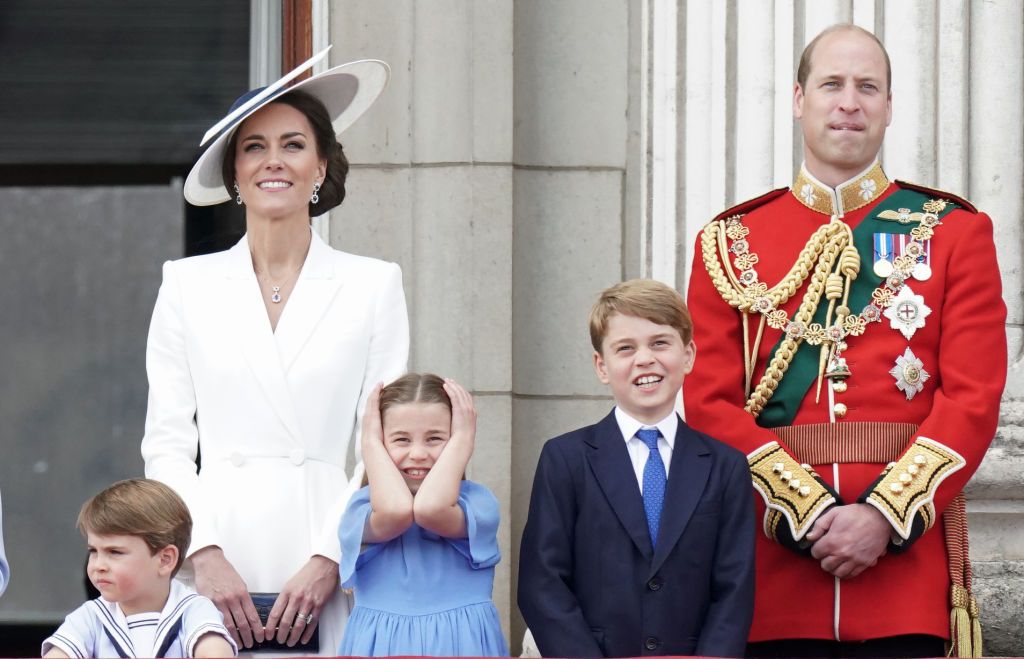Britain's Catherine, Duchess of Cambridge watches from a window of Buckingham Palace as the troops march past during the Queen's Birthday Parade, the Trooping the Colour, as part of Queen Elizabeth II's platinum jubilee celebrations, in London on June 2, 2022. - Huge crowds converged on central London in bright sunshine on Thursday for the start of four days of public events to mark Queen Elizabeth II's historic Platinum Jubilee, in what could be the last major public event of her long reign. (Photo by Jeff Mitchell / POOL / AFP) (Photo by JEFF MITCHELL/POOL/AFP via Getty Images)