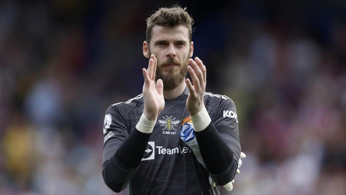 Manchester United goalkeeper David de Gea applauds the fans after the Premier League match at Selhurst Park, London. Picture date: Sunday May 22, 2022. (Photo by Steven Paston/PA Images via Getty Images)
