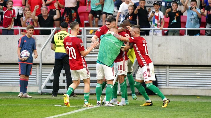 Hungarys Dominik Szoboszlai (centre) celebrates scoring their sides first goal of the game with team-mates and fans during the UEFA Nations League match at the Puskas Arena, Budapest. Picture date: Saturday June 4, 2022. (Photo by Nick Potts/PA Images via Getty Images)