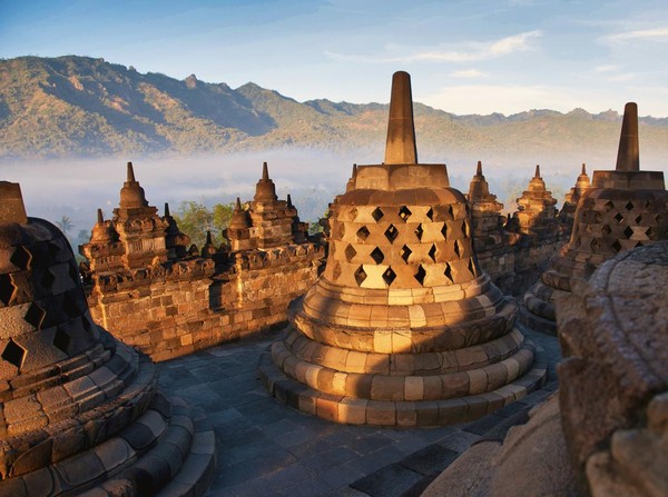 Famous Buddhist Temple Borobudur at Sunrise. Yogyakarta, Island Java - Indonesia