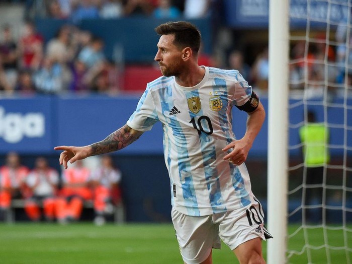 Argentina's forward Lionel Messi celebrates after scoring his team's second goal during the international friendly football match between Argentina and Estonia at El Sadar stadium in Pamplona on June 5, 2022. (Photo by ANDER GILLENEA / AFP) (Photo by ANDER GILLENEA/AFP via Getty Images)