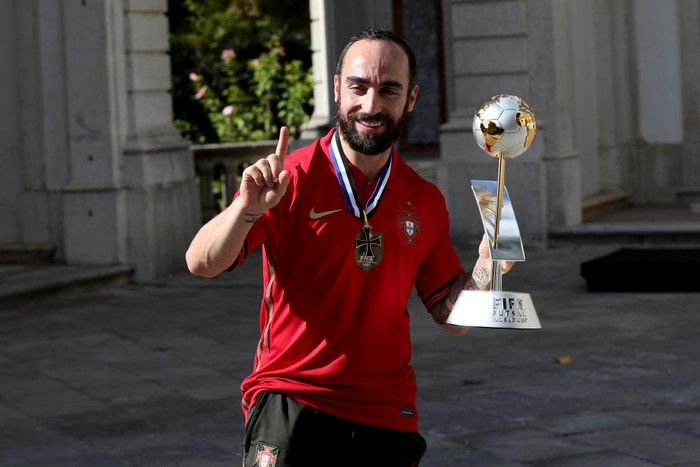 Portugals captain Ricardinho poses with FIFA Futsal World Cup 2021 trophy during a welcoming ceremony for the National Futsal team, at the Belem Palace in Lisbon, Portugal, on October 4, 2021. Portugal won the FIFA Futsal World Cup 2021 trophy after defeating Argentina (2-1) on October 03, in Kaunas, Lithuania. (Photo by Pedro Fiúza/NurPhoto via Getty Images)