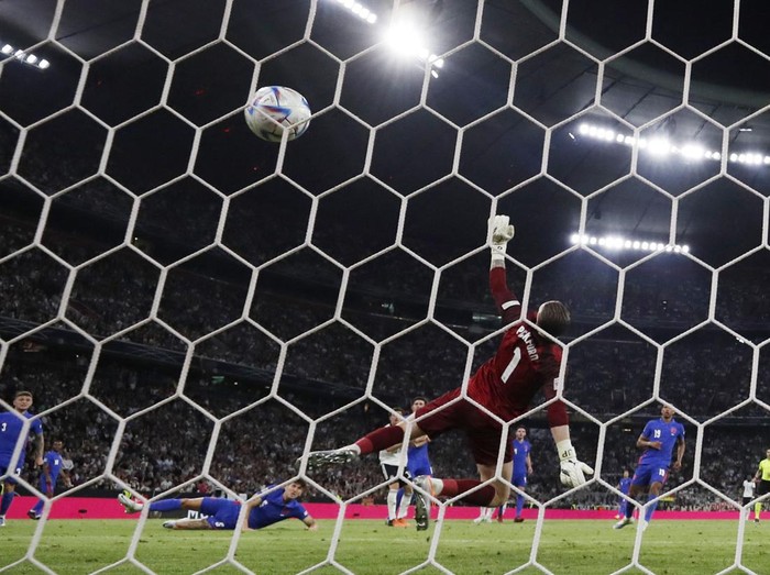 Soccer Football - UEFA Nations League - Group C - Germany v England - Allianz Arena, Munich, Germany - June 7, 2022 Germany's Jonas Hofmann scores their first goal past England's Jordan Pickford Action Images via Reuters/Lee Smith