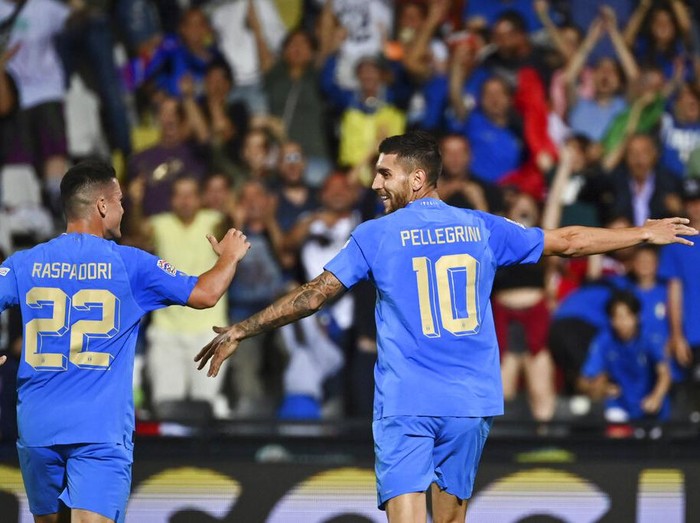 Italy's Wilfried Gnonto, right, competes for the ball with Hungary's Adam Lang, during the UEFA Nations League soccer match between Italy and Hungary, at the Dino Manuzzi stadium in Cesena, Italy, Tuesday, June 7, 2022. (Massimo Paolone/LaPresse via AP)