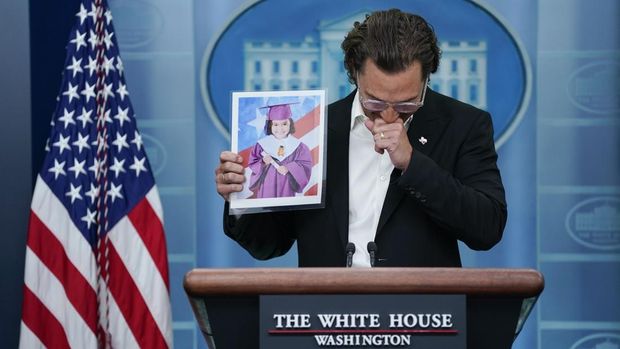 Actor Matthew McConaughey holds an image of Alithia Ramirez, 10, who was killed in the mass shooting at an elementary school in Uvalde, Texas, as he speaks during a press briefing at the White House, Tuesday, June 7, 2022, in Washington. (AP Photo/Evan Vucci)