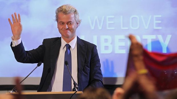 BERLIN - OCTOBER 02:  Dutch right-wing politician Geert Wilders greets supporters upon his arrival on October 2, 2010 in Berlin, Germany. Wilders came on the invitation of German renegade former Christian Democrat (CDU) Rene Stadtkewitz, an outspoken Islam critic, to speak to approximately 500 supporters in Berlin. Wilders is seeking to create an international alliance of critics of Islam, called the 