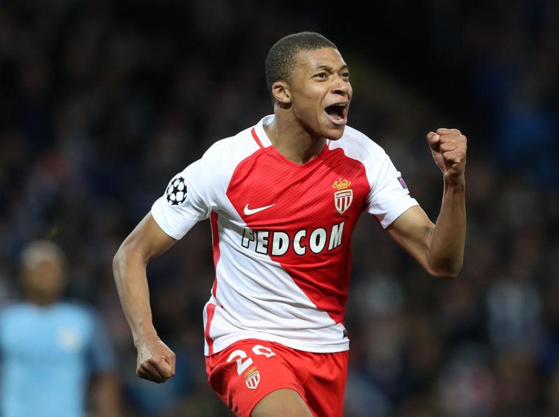 Monaco's Kylian Mbappe-Lottin celebrates scoring his side second goal during the UEFA Champions League match at the Etihad Stadium, Manchester. (Photo by Martin Rickett/PA Images via Getty Images)