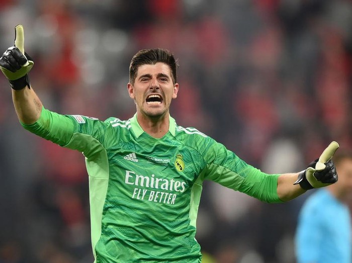 PARIS, FRANCE - MAY 28:  Thibaut Courtois of Real Madrid celebrates following their sides victory in the UEFA Champions League final match between Liverpool FC and Real Madrid at Stade de France on May 28, 2022 in Paris, France. (Photo by Shaun Botterill/Getty Images)