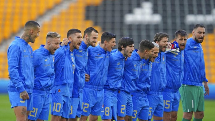 Italian players line-up for the anthems before the Nations League soccer match between England and Italy at Molineux Stadium in Wolverhampton, England, Saturday, June 11, 2022. (AP Photo/Jon Super)
