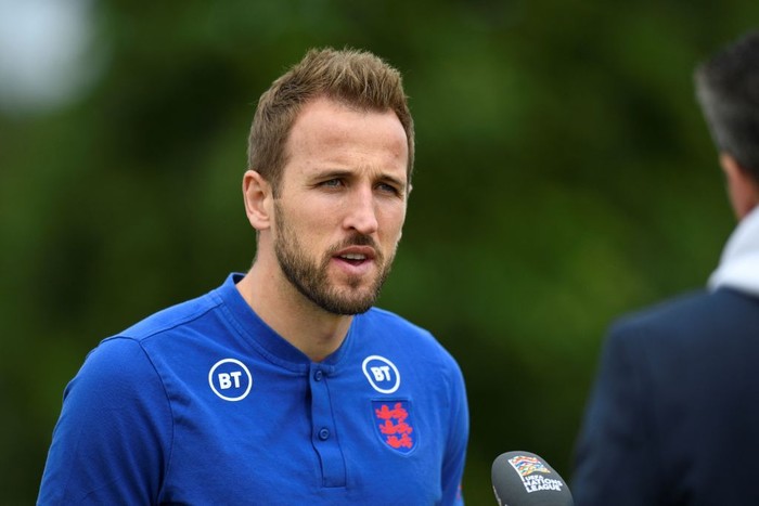 Englands striker Harry Kane speaks to journalists after a press conference at St Georges Park in Burton-upon-Trent on June 13, 2022 on the eve of their UEFA Nations League match against Hungary. - NOT FOR MARKETING OR ADVERTISING USE / RESTRICTED TO EDITORIAL USE (Photo by Oli SCARFF / AFP) / NOT FOR MARKETING OR ADVERTISING USE / RESTRICTED TO EDITORIAL USE (Photo by OLI SCARFF/AFP via Getty Images)