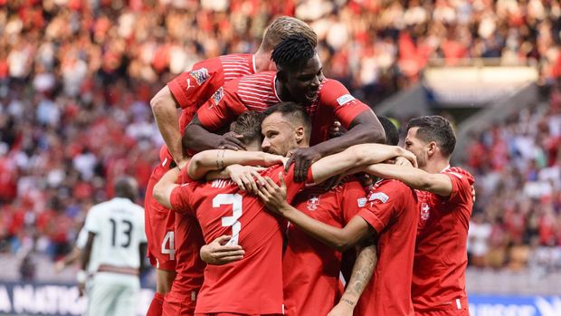 GENEVA, SWITZERLAND - JUNE 12: Haris Seferovic of Switzerland (C) celebrating his goal with his teammates during the UEFA Nations League League A Group 2 match between Switzerland and Portugal at Stade de Geneve on June 12, 2022 in Geneva, Switzerland. (Photo by Marcio Machado/Eurasia Sport Images/Getty Images)