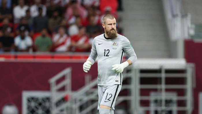 DOHA, QATAR - JUNE 13: Goalkeeper Andrew Redmayne of Australia during the 2022 FIFA World Cup Playoff match between Australia Socceroos and Peru at Ahmad Bin Ali Stadium on June 13, 2022 in Al Rayyan, Doha, Qatar. (Photo by Matthew Ashton - AMA/Getty Images)