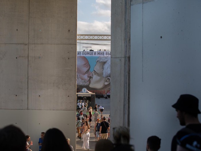 BARCELONA, CATALONIA, SPAIN - JUNE 09: A canvas with a drawing of a kiss between Manchester City coach Pep Guardiola (l) and AS Roma coach Jose Mourinho (r) on June 9, 2022, in Barcelona, Catalonia, Spain. This canvas replaces the one from last week's Primavera Sound Festival, in which the mayor of Barcelona, Ada Colau, and the president of the Community of Madrid, Isabel Diaz Ayuso, were kissing. This image is reminiscent of the famous graffiti of the kiss between communist leaders Erich Honecker and Leonidas Brezhnev on the Berlin Wall, and includes the message that is also read in this original work: 'My God, help me to survive this mortal love'. (Photo By David Zorrakino/Europa Press via Getty Images)