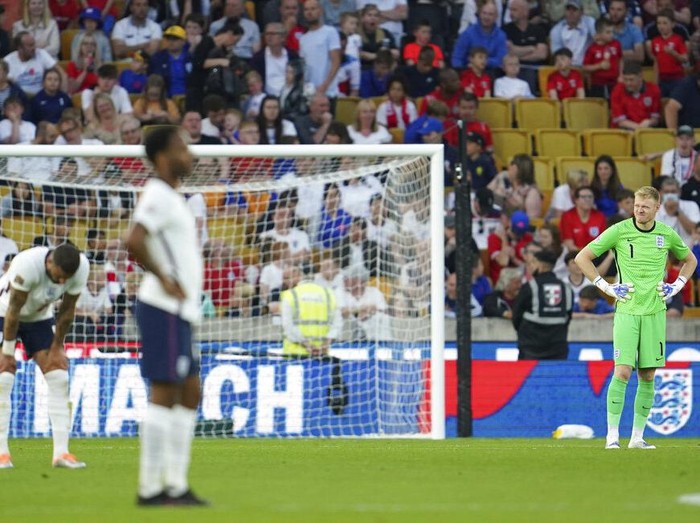 Hungary's Roland Sallai, center is congratulated after scoring the opening goal during the UEFA Nations League soccer match between England and Hungary at the Molineux stadium in Wolverhampton, England, Tuesday, June 14, 2022. (AP Photo/Jon Super)