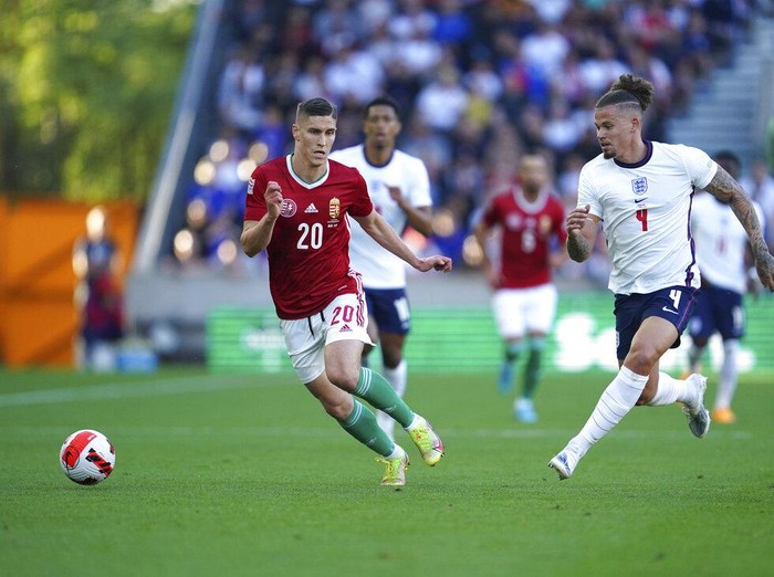 Hungary's Roland Sallai, center is congratulated after scoring the opening goal during the UEFA Nations League soccer match between England and Hungary at the Molineux stadium in Wolverhampton, England, Tuesday, June 14, 2022. (AP Photo/Jon Super)