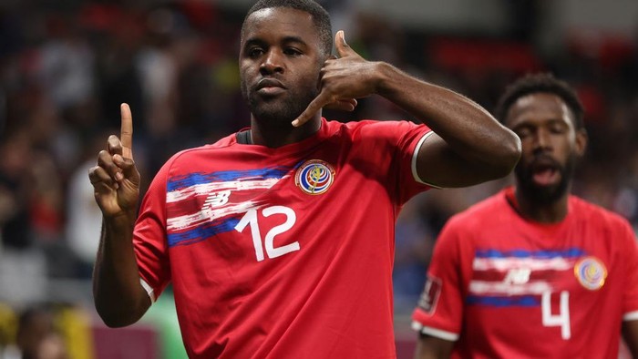 DOHA, QATAR - JUNE 14: Joel Campbell of Costa Rica celebrates after scoring a goal to make it 1-0 in the 2022 FIFA World Cup Playoff match between Costa Rica and New Zealand at Ahmad Bin Ali Stadium on June 14, 2022 in Doha, Qatar. (Photo by Matthew Ashton - AMA/Getty Images)