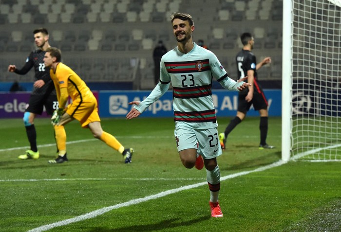 KOPER, SLOVENIA - MARCH 25: Fabio Viera of Portugal celebrates after scoring their teams first goal during the 2021 UEFA European Under-21 Championship Group D match between Portugal and Croatia at Stadion Bonifika on March 25, 2021 in Koper, Slovenia. Sporting stadiums around Slovenia remain under strict restrictions due to the Coronavirus Pandemic as Government social distancing laws prohibit fans inside venues resulting in games being played behind closed doors. (Photo by Tullio Puglia - UEFA/UEFA via Getty Images)