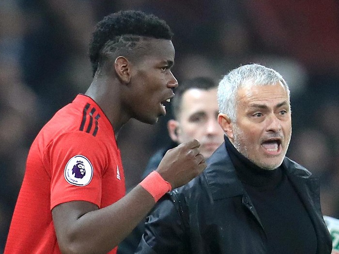 Manchester Uniteds Paul Pogba (left) speaks with Manchester United manager Jose Mourinho Manchester United v Arsenal - Premier League - Old Trafford 05-12-2018 . (Photo by  Mike Egerton/PA Images via Getty Images)