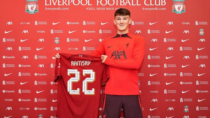 KIRKBY, ENGLAND - JUNE 19: New Liverpool signing Calvin Ramsey signs for the club at AXA Training Centre on June 19, 2022 in Kirkby, England. (Photo by Nick Taylor/Liverpool FC/Liverpool FC via Getty Images)
