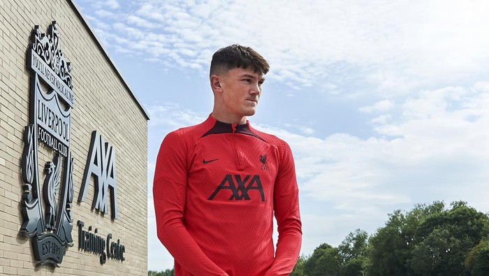 KIRKBY, ENGLAND - JUNE 19: New Liverpool signing Calvin Ramsey signs for the club at AXA Training Centre on June 19, 2022 in Kirkby, England. (Photo by Nick Taylor/Liverpool FC/Liverpool FC via Getty Images)