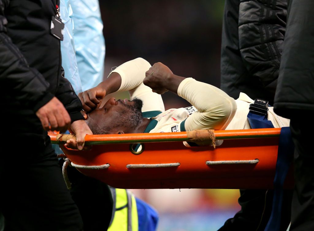 MANCHESTER, ENGLAND - OCTOBER 24: Naby Keita of Liverpool goes off injured after a collision with Paul Pogba of Manchester United during the Premier League match between Manchester United and Liverpool at Old Trafford on October 24, 2021 in Manchester, England. (Photo by Alex Livesey - Danehouse/Getty Images)