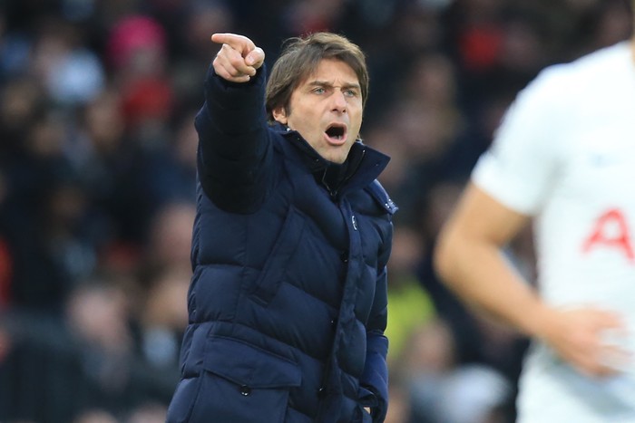 Tottenham Hotspurs Italian head coach Antonio Conte gestures on the touchline during the English Premier League football match between Manchester United and Tottenham Hotspur at Old Trafford in Manchester, north west England, on March 12, 2022. - RESTRICTED TO EDITORIAL USE. No use with unauthorized audio, video, data, fixture lists, club/league logos or live services. Online in-match use limited to 120 images. An additional 40 images may be used in extra time. No video emulation. Social media in-match use limited to 120 images. An additional 40 images may be used in extra time. No use in betting publications, games or single club/league/player publications. (Photo by Lindsey Parnaby / AFP) / RESTRICTED TO EDITORIAL USE. No use with unauthorized audio, video, data, fixture lists, club/league logos or live services. Online in-match use limited to 120 images. An additional 40 images may be used in extra time. No video emulation. Social media in-match use limited to 120 images. An additional 40 images may be used in extra time. No use in betting publications, games or single club/league/player publications. / RESTRICTED TO EDITORIAL USE. No use with unauthorized audio, video, data, fixture lists, club/league logos or live services. Online in-match use limited to 120 images. An additional 40 images may be used in extra time. No video emulation. Social media in-match use limited to 120 images. An additional 40 images may be used in extra time. No use in betting publications, games or single club/league/player publications. (Photo by LINDSEY PARNABY/AFP via Getty Images)