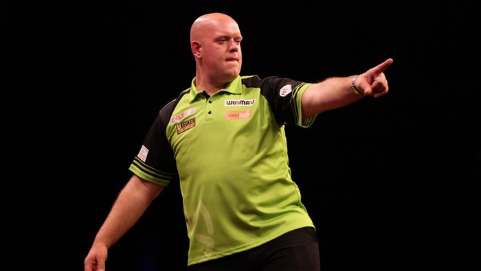SHEFFIELD, ENGLAND - MAY 12: Michael van Gerwen of Netherlands celebrates during their match against Gerwyn Price of Wales on night 14 of the Cazoo Premier League Darts at Utilita Area Sheffield on May 12, 2022 in Sheffield, England. (Photo by George Wood/Getty Images)