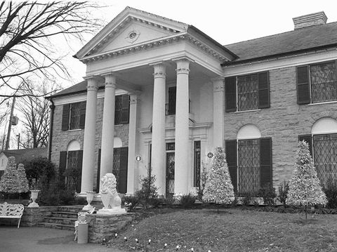 photo taken 01 August 1985 shows Graceland, the Elvis Presley mansion in Memphis, Tennessee.  Lisa-Marie Presley, the daughter of the rock legend, celebrated her 30th birthday 01 February and 