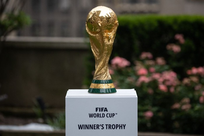 The FIFA World Cup trophy is displayed during an event in New York after an announcement related to the staging of the FIFA World Cup 2026, on June 16, 2022. - Mexico Citys iconic Azteca Stadium and the Los Angeles Rams multi-billion-dollar SoFi St