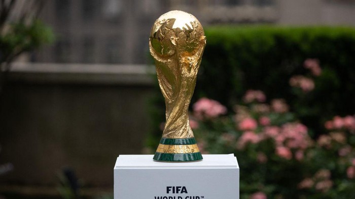 The FIFA World Cup trophy is displayed during an event in New York after an announcement related to the staging of the FIFA World Cup 2026, on June 16, 2022. - Mexico Citys iconic Azteca Stadium and the Los Angeles Rams multi-billion-dollar SoFi Stadium were among 16 venues named on June 16 to stage games at the 2026 World Cup being held in the United States, Canada and Mexico. (Photo by Yuki IWAMURA / AFP) (Photo by YUKI IWAMURA/AFP via Getty Images)