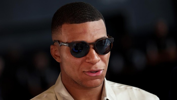 NEW YORK, NEW YORK - JUNE 23: Kylian Mbappe looks on during the 2022 NBA Draft at Barclays Center on June 23, 2022 in New York City. NOTE TO USER: User expressly acknowledges and agrees that, by downloading and or using this photograph, User is consenting to the terms and conditions of the Getty Images License Agreement. (Photo by Arturo Holmes/Getty Images)