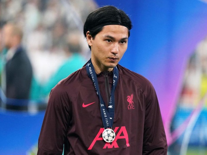 PARIS, FRANCE - MAY 28:  Takumi　Minamino of Liverpool is seen during the trophy ceremony following the UEFA Champions League final match between Liverpool FC and Real Madrid at Stade de France on May 28, 2022 in Paris, France. (Photo by Etsuo Hara/Getty Images)