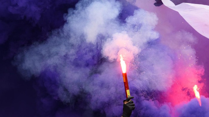 08 May 2022, Saxony, Aue: Soccer: 2. Bundesliga, FC Erzgebirge Aue - SV Werder Bremen, 33. matchday, Erzgebirgsstadion. Aues fans set off pyrotechnics. Photo: Robert Michael/dpa - IMPORTANT NOTE: In accordance with the requirements of the DFL Deutsche Fußball Liga and the DFB Deutscher Fußball-Bund, it is prohibited to use or have used photographs taken in the stadium and/or of the match in the form of sequence pictures and/or video-like photo series. (Photo by Robert Michael/picture alliance via Getty Images)