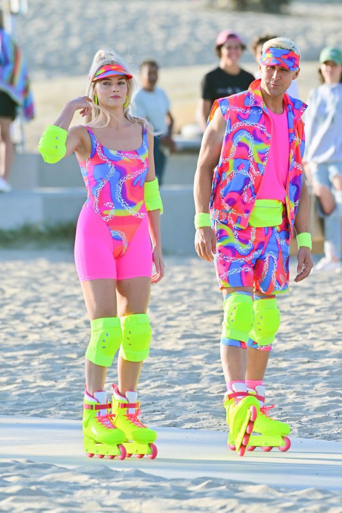 LOS ANGELES CA - JUNE 27:  Margot Robbie and Ryan Gosling on rollerblades film new scenes for 'Barbie' in Venice California. 27 Jun 2022. (Photo by MEGA/GC Images)