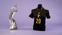 Belgia tampil serba hitam dengan paduan warna kuning dan merah sebagai ornamen.