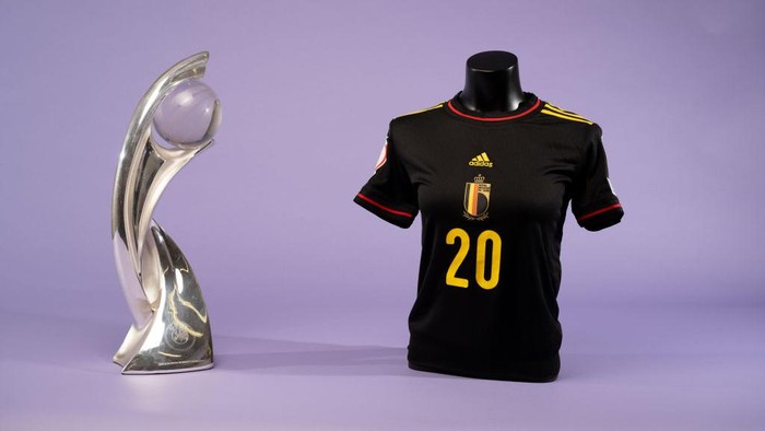 NYON, SWITZERLAND - JUNE 28: A view of the Belgium jersey on a mannequin next to the UEFA Women's EURO trophy during the UEFA Women's EURO 2022 Jersey Shoot at the UEFA Headquarters, The House of the European Football, on June 28, 2022 in Nyon, Switzerland. (Photo by Kristian Skeie - UEFA/UEFA via Getty Images)