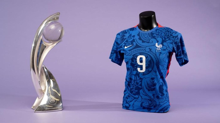 1241601659 NYON, SWITZERLAND - JUNE 28: A view of the Belgium jersey on a mannequin next to the UEFA Women's EURO trophy during the UEFA Women's EURO 2022 Jersey Shoot at the UEFA Headquarters, The House of the European Football, on June 28, 2022 in Nyon, Switzerland. (Photo by Kristian Skeie - UEFA/UEFA via Getty Images)
