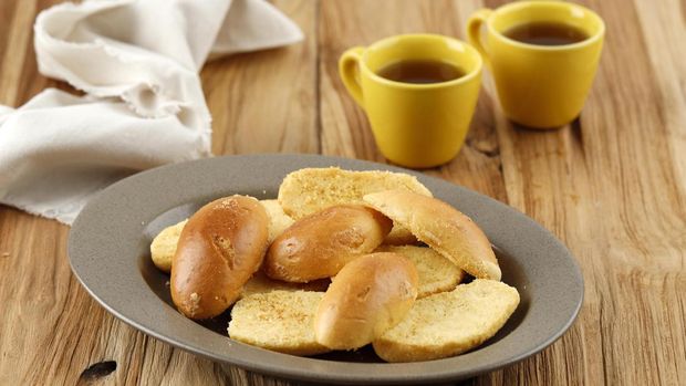 ilustrasi kue kering bagelen Bagelen Bread Cake, Crispy Bread with Butter Spread and White Sugar Sprinkle. Usually Served with Tea for Tea Time, Popular in Indonesia as Snack