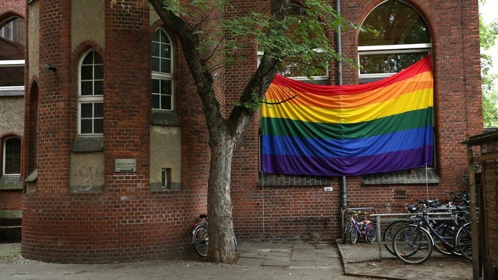 A rainbow flag hangs outside the Ibn Rushd-Goethe mosque in Berlin, Germany on July 1, 2022. - The flag was hoisted prior to Friday prayers in order to set a sign, especially for members of the muslim community, that they dont have to choose between their faith and their sexual identity, but are accepted as they are. (Photo by Adam BERRY / AFP)