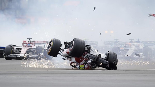 Zhou Guanyu of China Alfa Romeo F1 and George Russell of Great Britain and AMG Petronas F1 crash their cars during the race of the F1 Grand Prix of Great Britain at Silverstone on July 3, 2022 in Northampton, United Kingdom. (Photo by Jose Breton/Pics Action/NurPhoto via Getty Images)