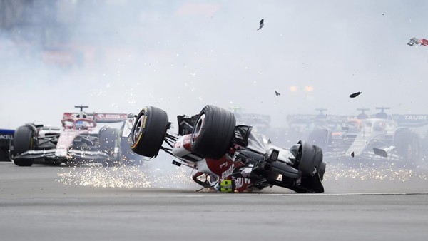Zhou Guanyu Zhou Guanyu of China Alfa Romeo F1 and George Russell of Great Britain and AMG Petronas F1 crash their cars during the race of the F1 Grand Prix of Great Britain at Silverstone on July 3, 2022 in Northampton, United Kingdom. (Photo by Jose Breton/Pics Action/NurPhoto via Getty Images)
