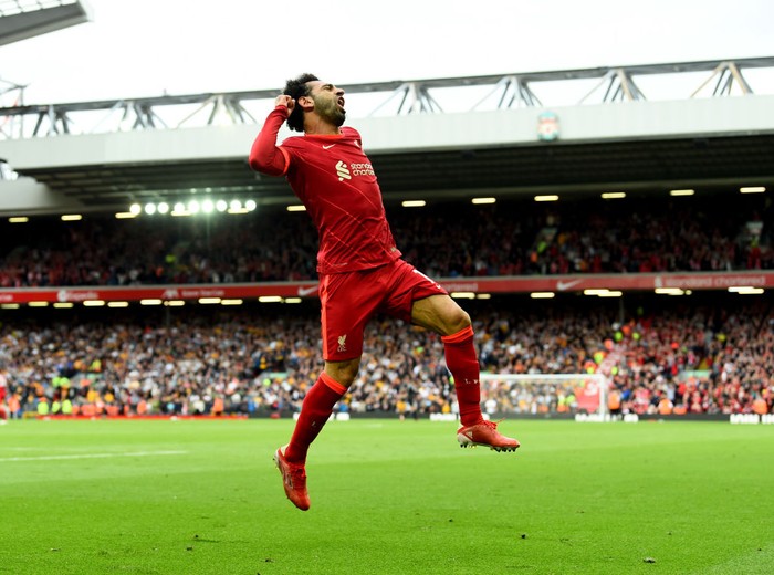 LIVERPOOL, ENGLAND - MAY 22: (THE SUN OUT, THE SUN ON SUNDAY OUT) Mohamed Salah of Liverpool celebrates after scoring the second goal making the score 2-1 during the Premier League match between Liverpool and Wolverhampton Wanderers at Anfield on May 22, 2022 in Liverpool, England. (Photo by Andrew Powell/Liverpool FC via Getty Images)